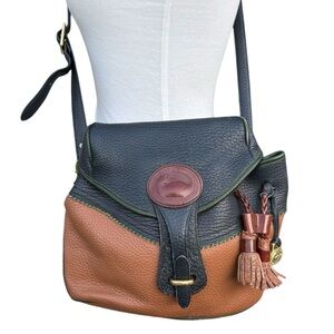 Vintage Dooney & Bourke Teton Drawstring All Weather Leather Saddle Bag